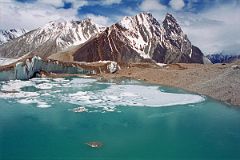 
Green Glacial Lake On Upper Baltoro Glacier With Mitre Peak Behind
